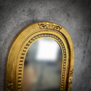 Espejo decorativo de madera Bulig Oval Buttons de 60x100cm en Oro (envejecido)